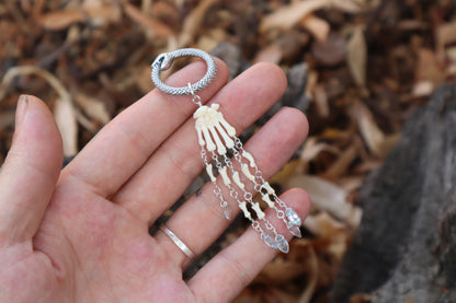 Fluid Striped Skunk Paw Articulation with Sky Blue Topaz “Claws”
