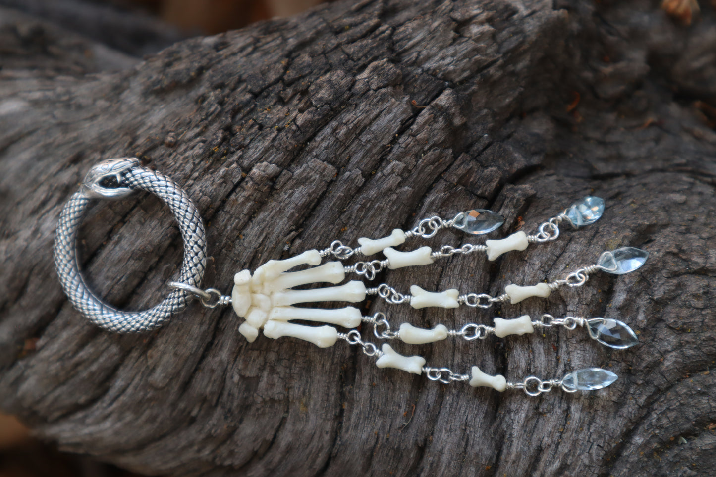 Fluid Striped Skunk Paw Articulation with Sky Blue Topaz “Claws”