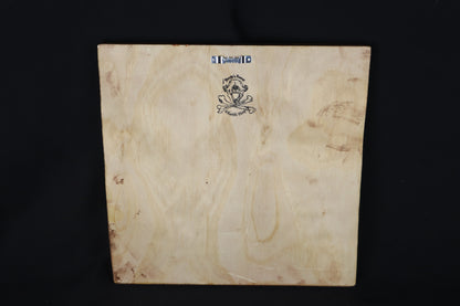 Large Mountain Lion Paw Prints on Wood