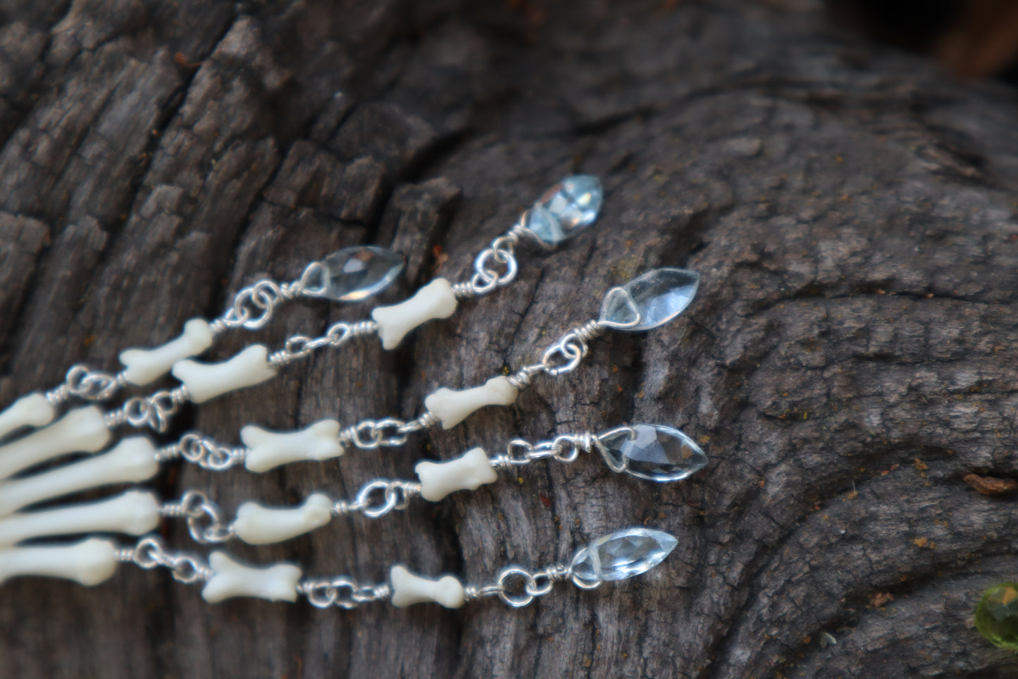 Fluid Striped Skunk Paw Articulation with Sky Blue Topaz “Claws”