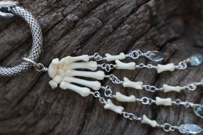 Fluid Striped Skunk Paw Articulation with Sky Blue Topaz “Claws”