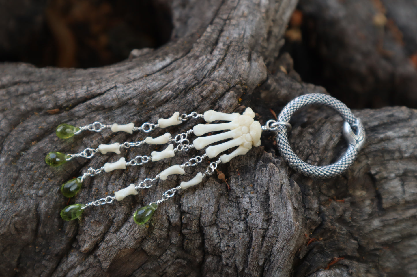 Fluid Striped Skunk Paw Articulation with Peridot “Claws”