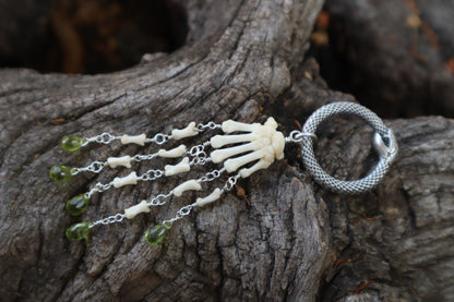 Fluid Striped Skunk Paw Articulation with Peridot “Claws”