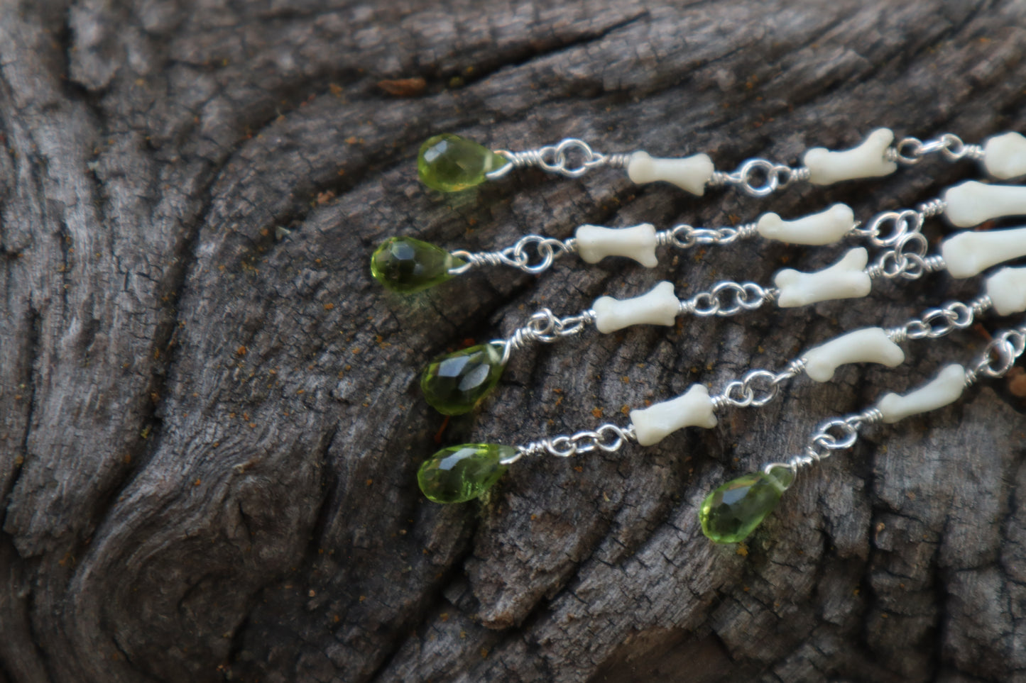 Fluid Striped Skunk Paw Articulation with Peridot “Claws”