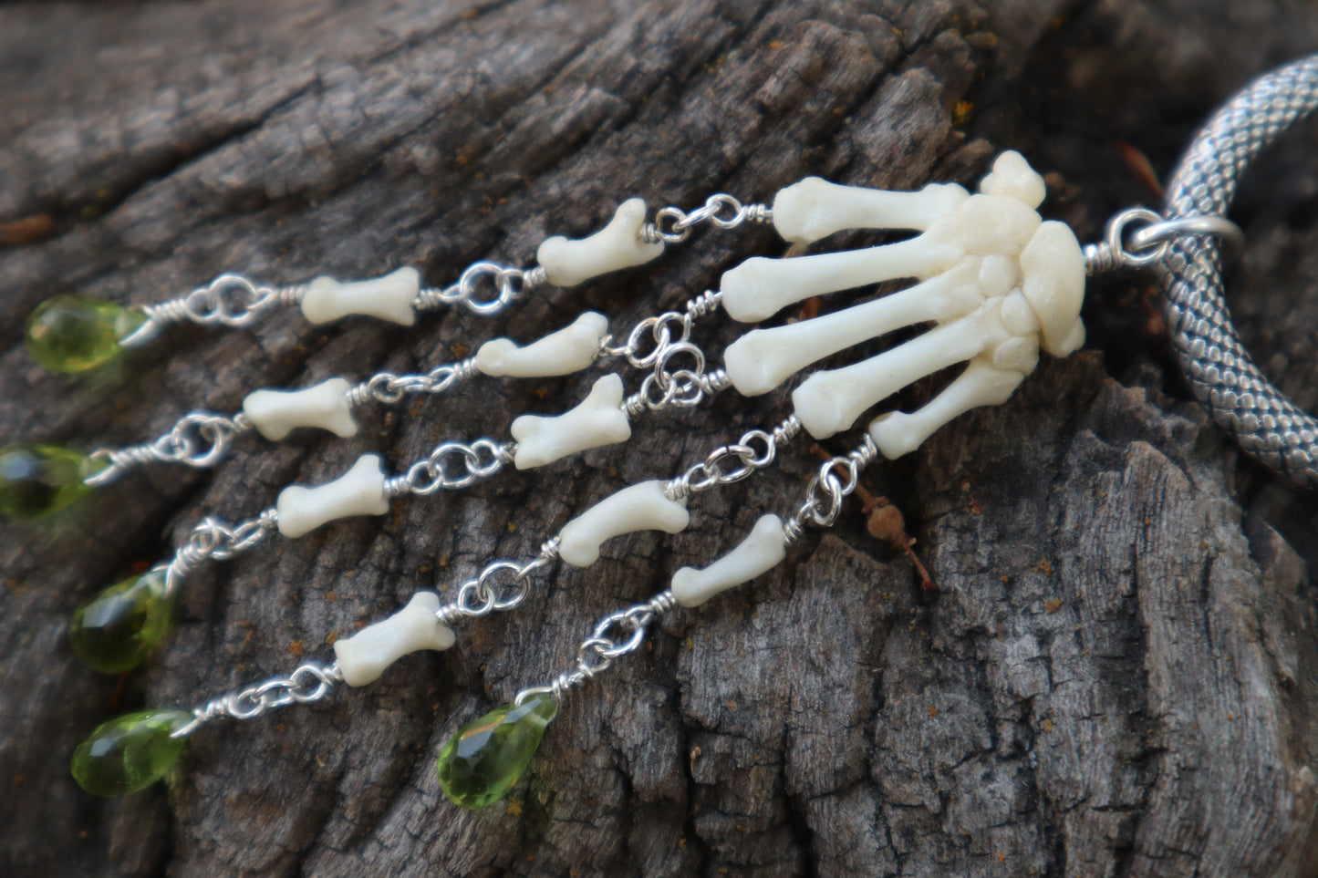 Fluid Striped Skunk Paw Articulation with Peridot “Claws”