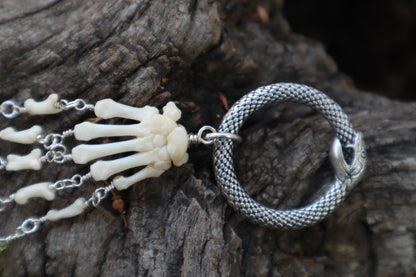 Fluid Striped Skunk Paw Articulation with Peridot “Claws”