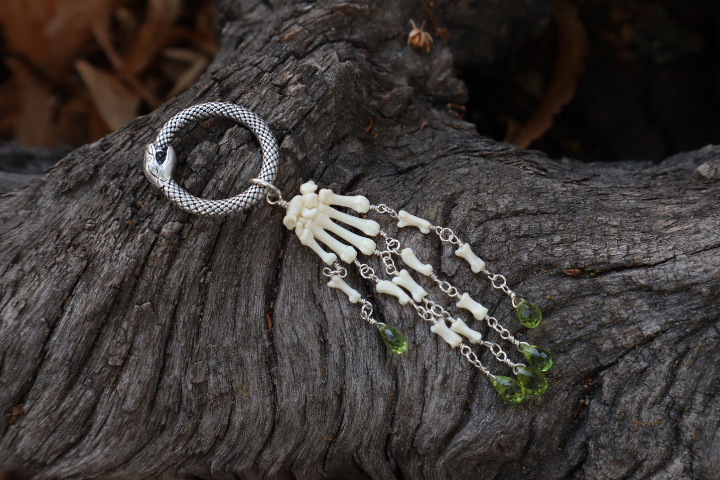 Fluid Striped Skunk Paw Articulation with Peridot “Claws”