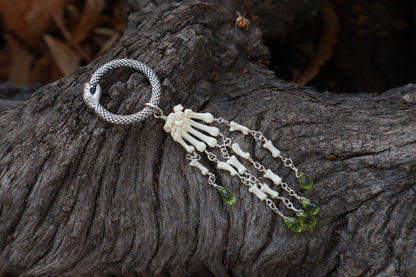 Fluid Striped Skunk Paw Articulation with Peridot “Claws”