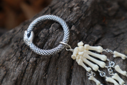 Fluid Striped Skunk Paw Articulation with Peridot “Claws”