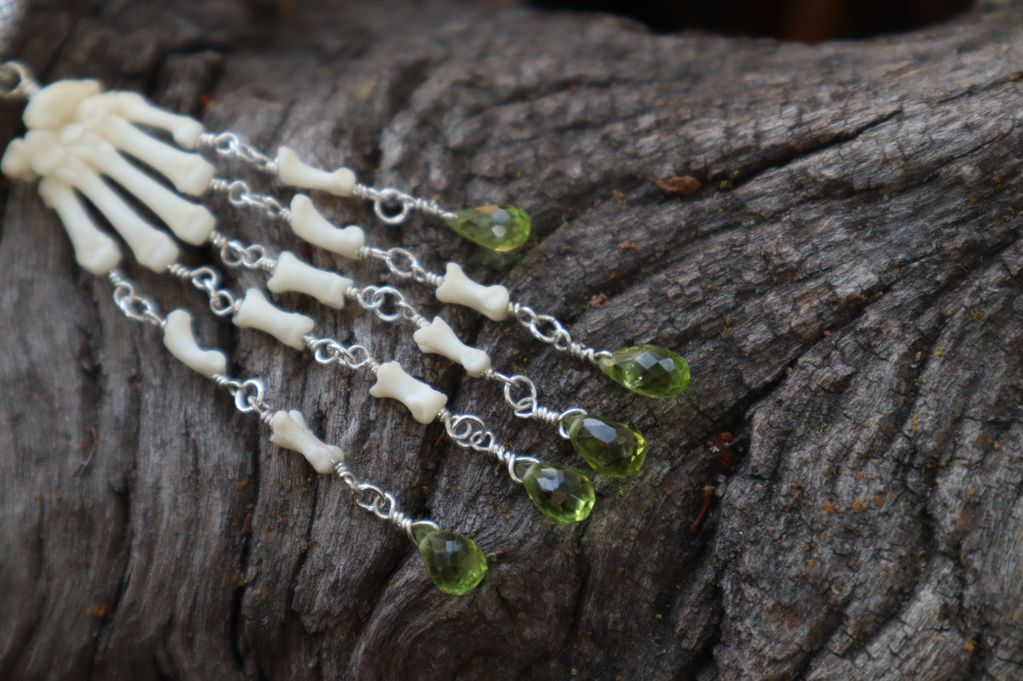 Fluid Striped Skunk Paw Articulation with Peridot “Claws”