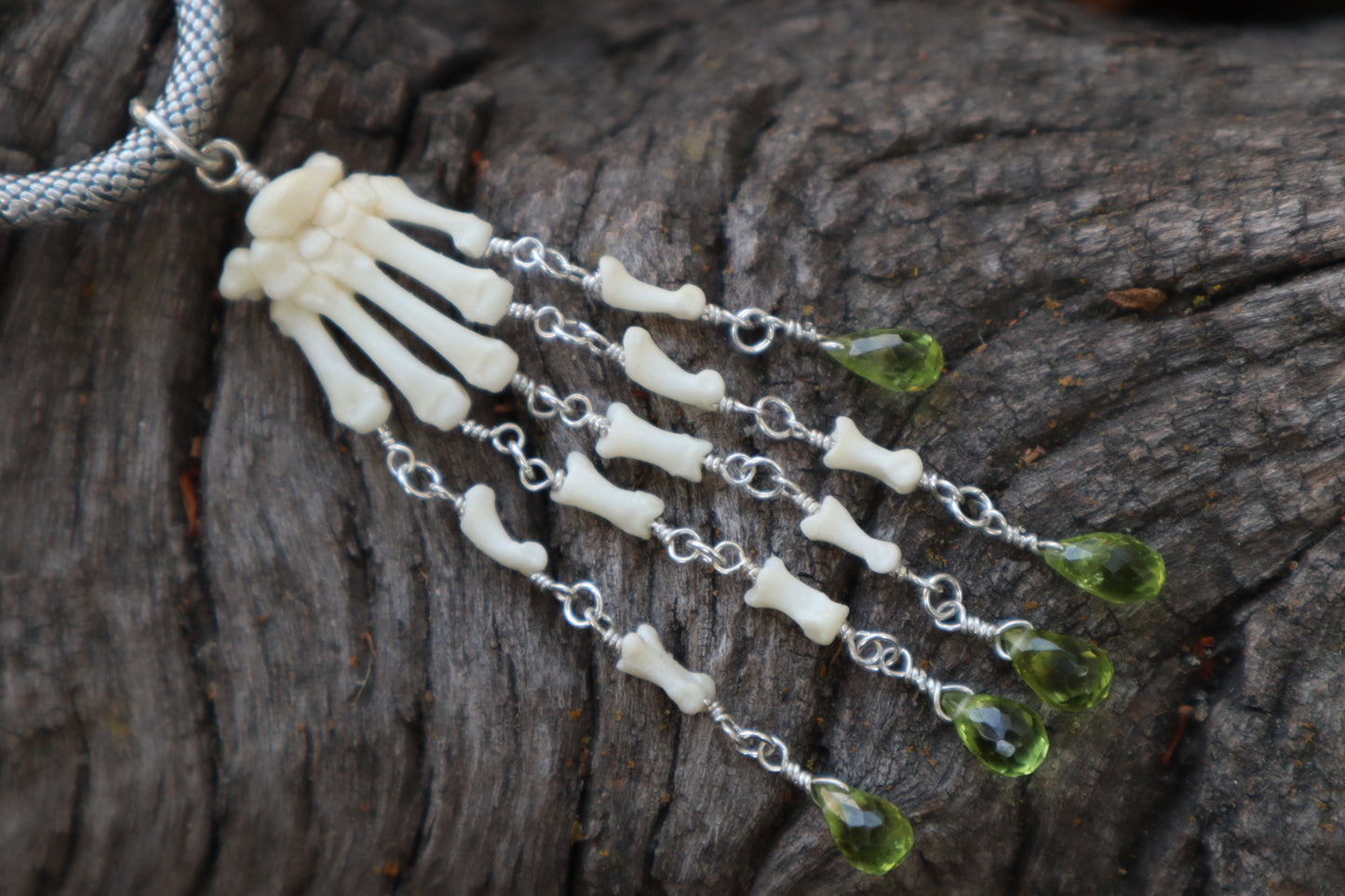 Fluid Striped Skunk Paw Articulation with Peridot “Claws”