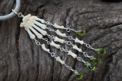 Fluid Striped Skunk Paw Articulation with Peridot “Claws”
