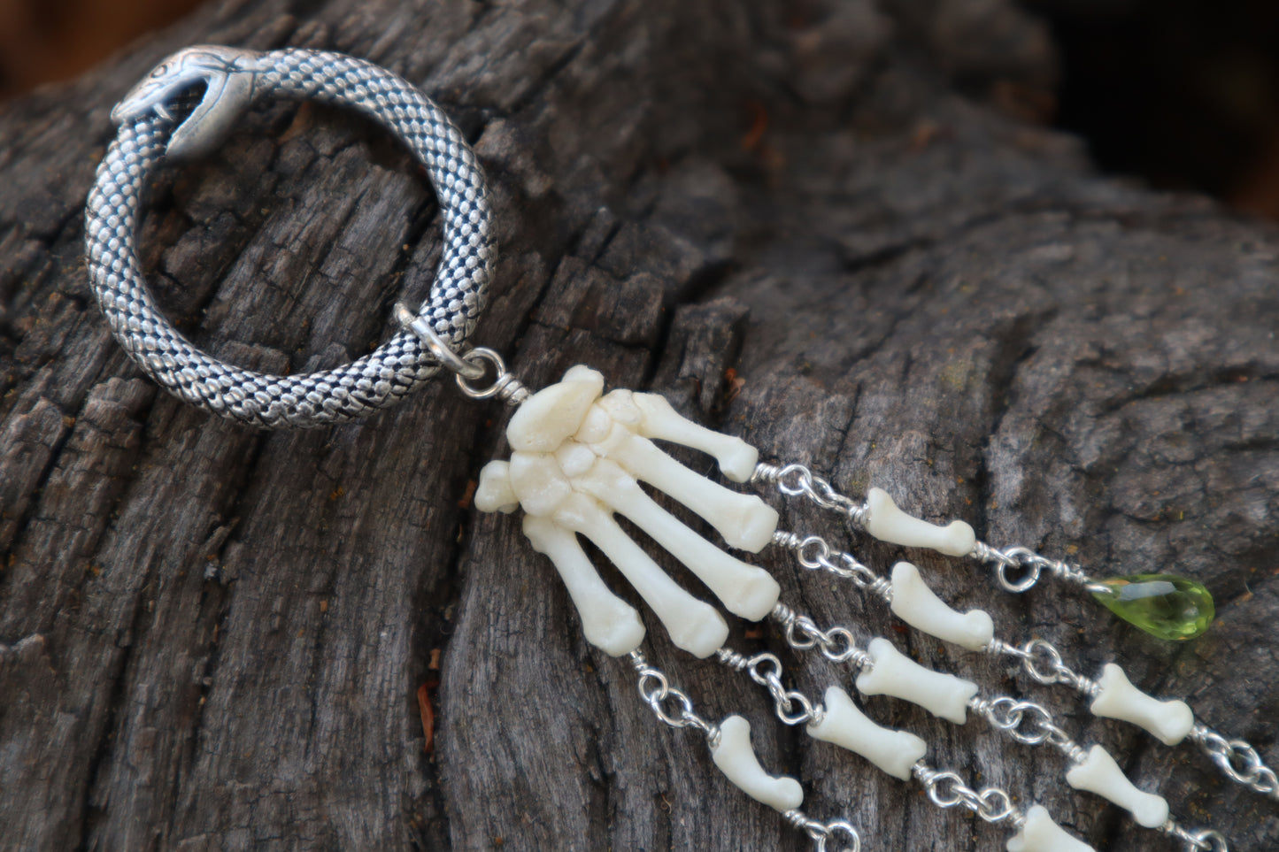 Fluid Striped Skunk Paw Articulation with Peridot “Claws”