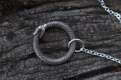 Domestic Cat Femur Pendulum with Ouroboros Ring