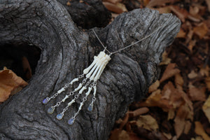 Fluid Striped Skunk Paw Articulation Necklace with Opal “Claws”