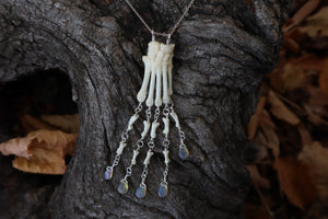 Fluid Striped Skunk Paw Articulation Necklace with Opal “Claws”