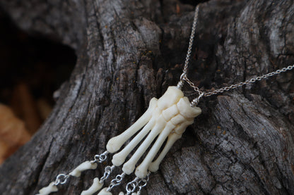 Fluid Striped Skunk Paw Articulation Necklace with Opal “Claws”