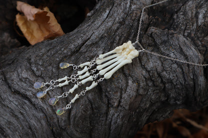 Fluid Striped Skunk Paw Articulation Necklace with Opal “Claws”