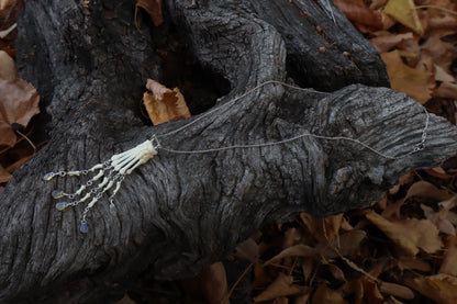 Fluid Striped Skunk Paw Articulation Necklace with Opal “Claws”