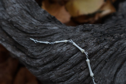 Fluid Raccoon Tail Articulation with Ouroboros Ring
