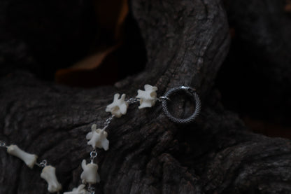 Fluid Striped Skunk Tail Articulation with Ouroboros Ring