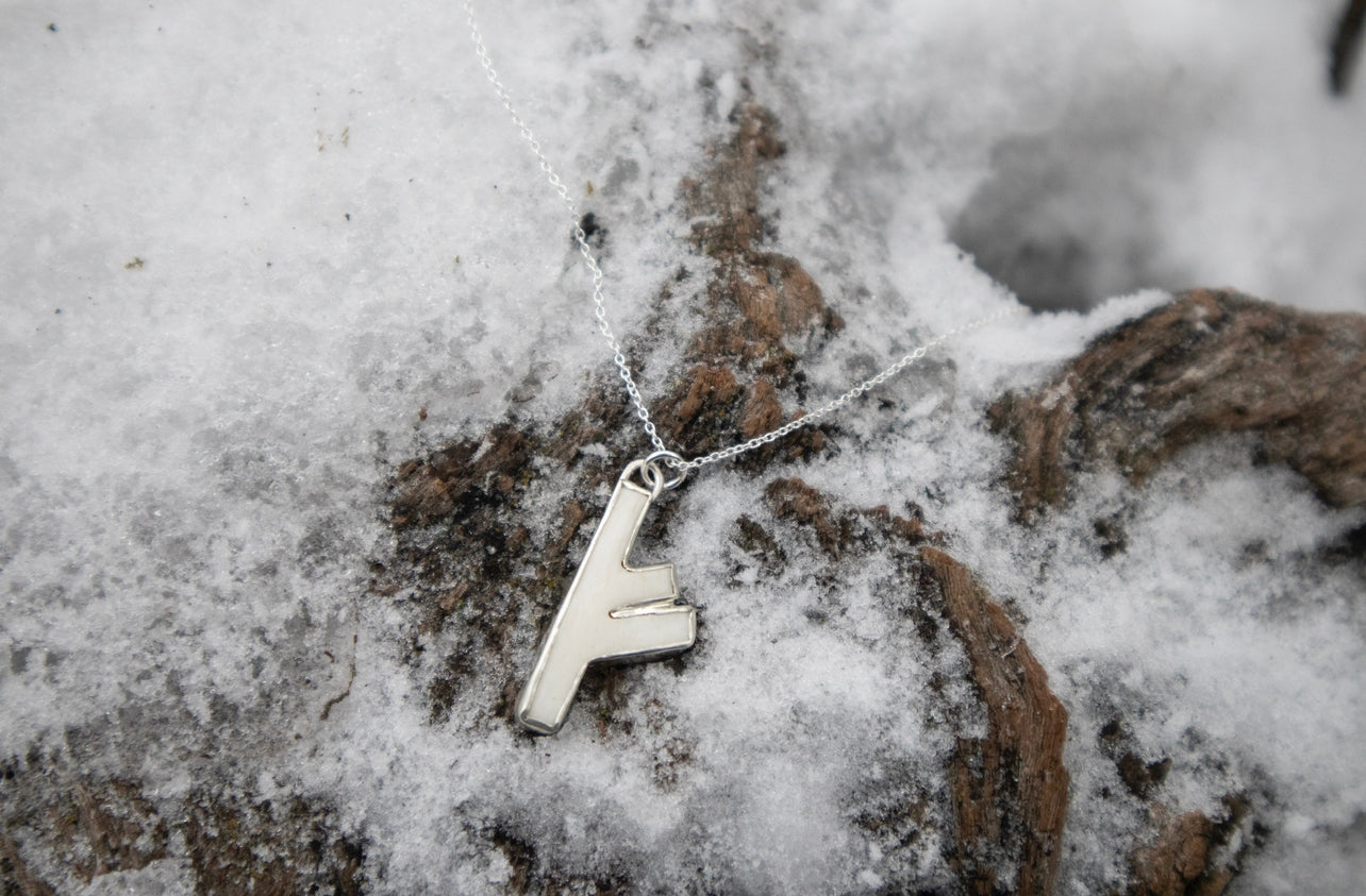 Fehu Wolf Bone and Silver Talisman