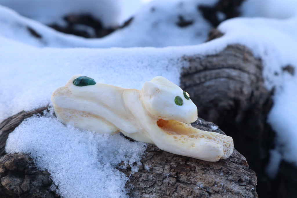 Reserved for Amanda - Mountain Lion Bone Carving with an Emerald and Peridot Eyes