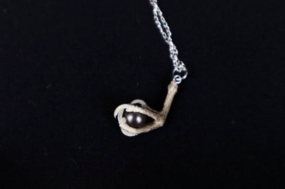 Clutched Pearl Necklace