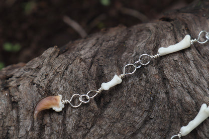Fluid Raccoon Toe Earrings