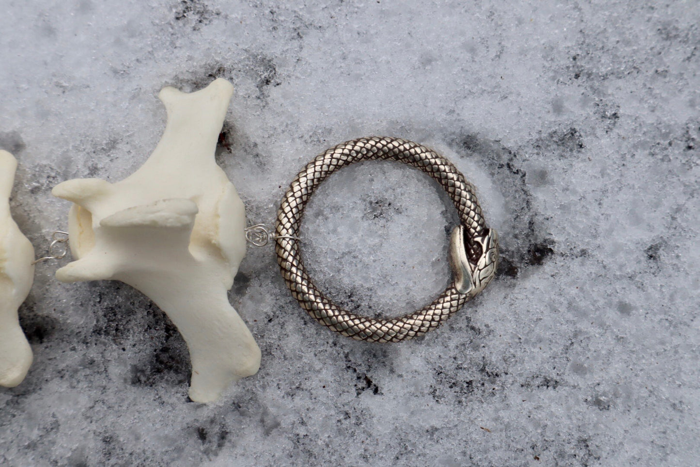 Fluid Bison Tail Articulation with Ouroboros Ring