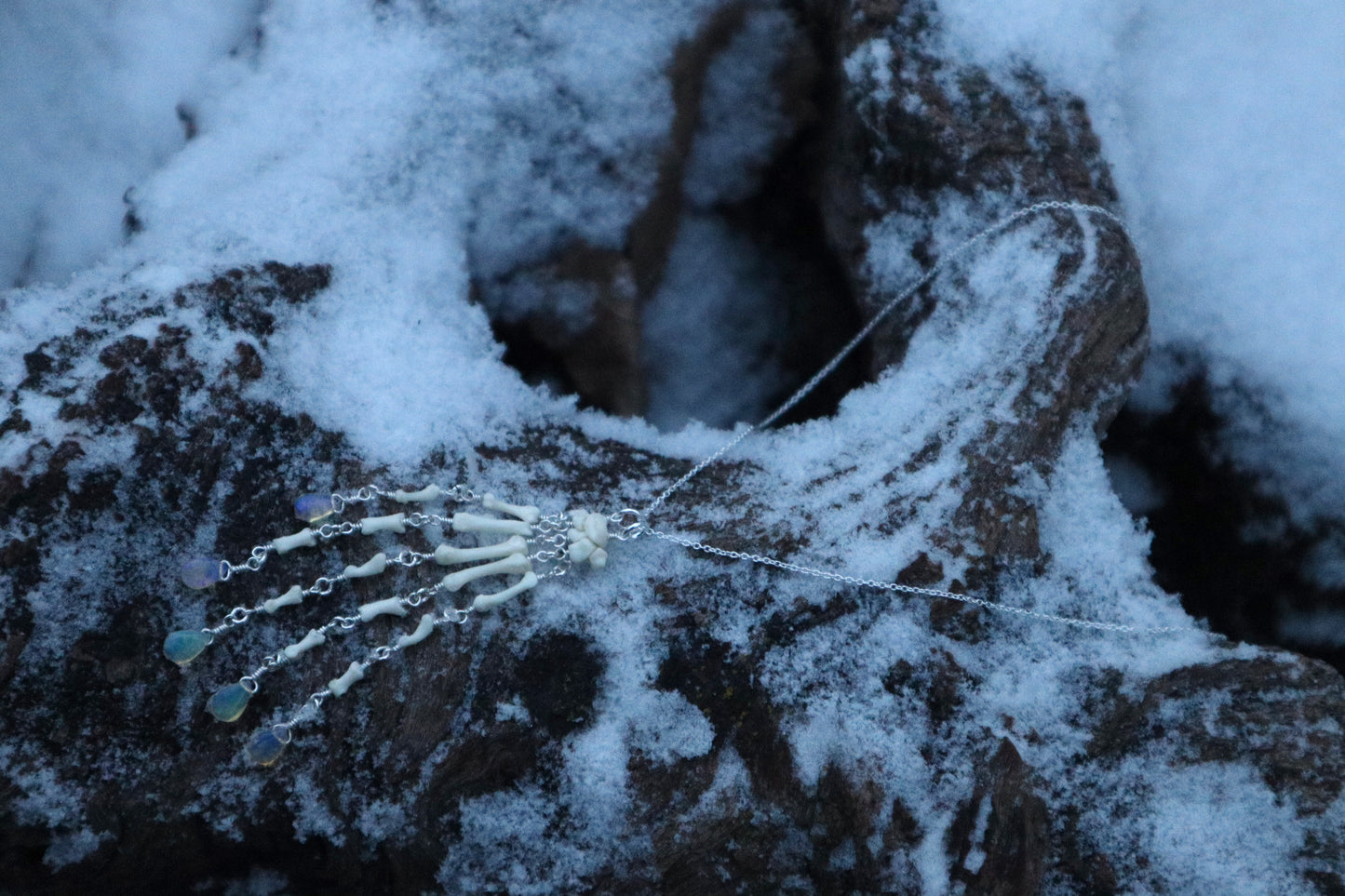 Reserved for Cora - Fluid Striped Skunk Paw Articulation Necklace with Opal “Claws”
