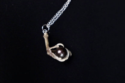 Clutched Pearl Necklace