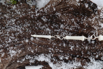 Fluid Mountain Lion Tail Tip Articulation with Ouroboros Ring