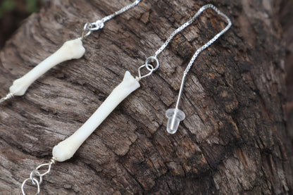 Fluid Raccoon Toe Earrings