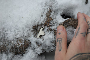 Fehu Wolf Bone and Silver Talisman