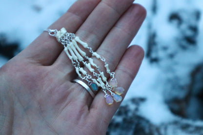 Reserved for Cora - Fluid Striped Skunk Paw Articulation Necklace with Opal “Claws”