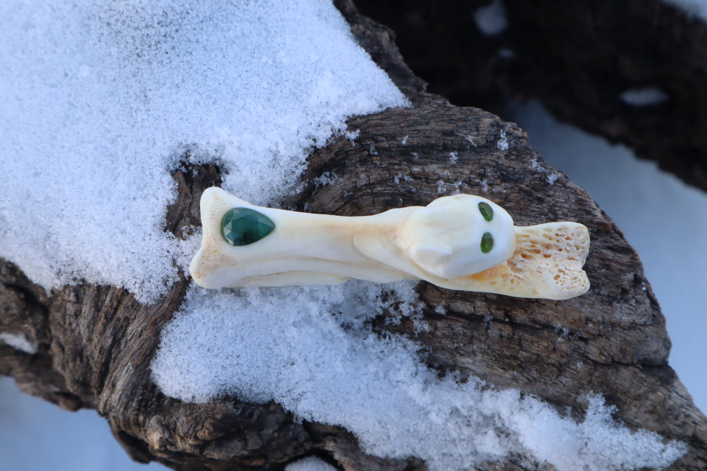 Reserved for Amanda - Mountain Lion Bone Carving with an Emerald and Peridot Eyes