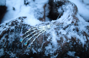 Reserved for Cora - Fluid Striped Skunk Paw Articulation Necklace with Opal “Claws”