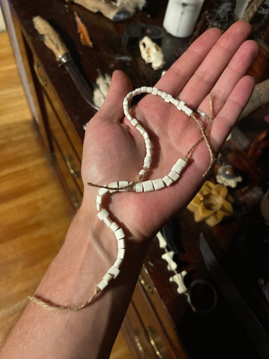 Reserved for Emily - Raccoon and Red Fox Bone Beads