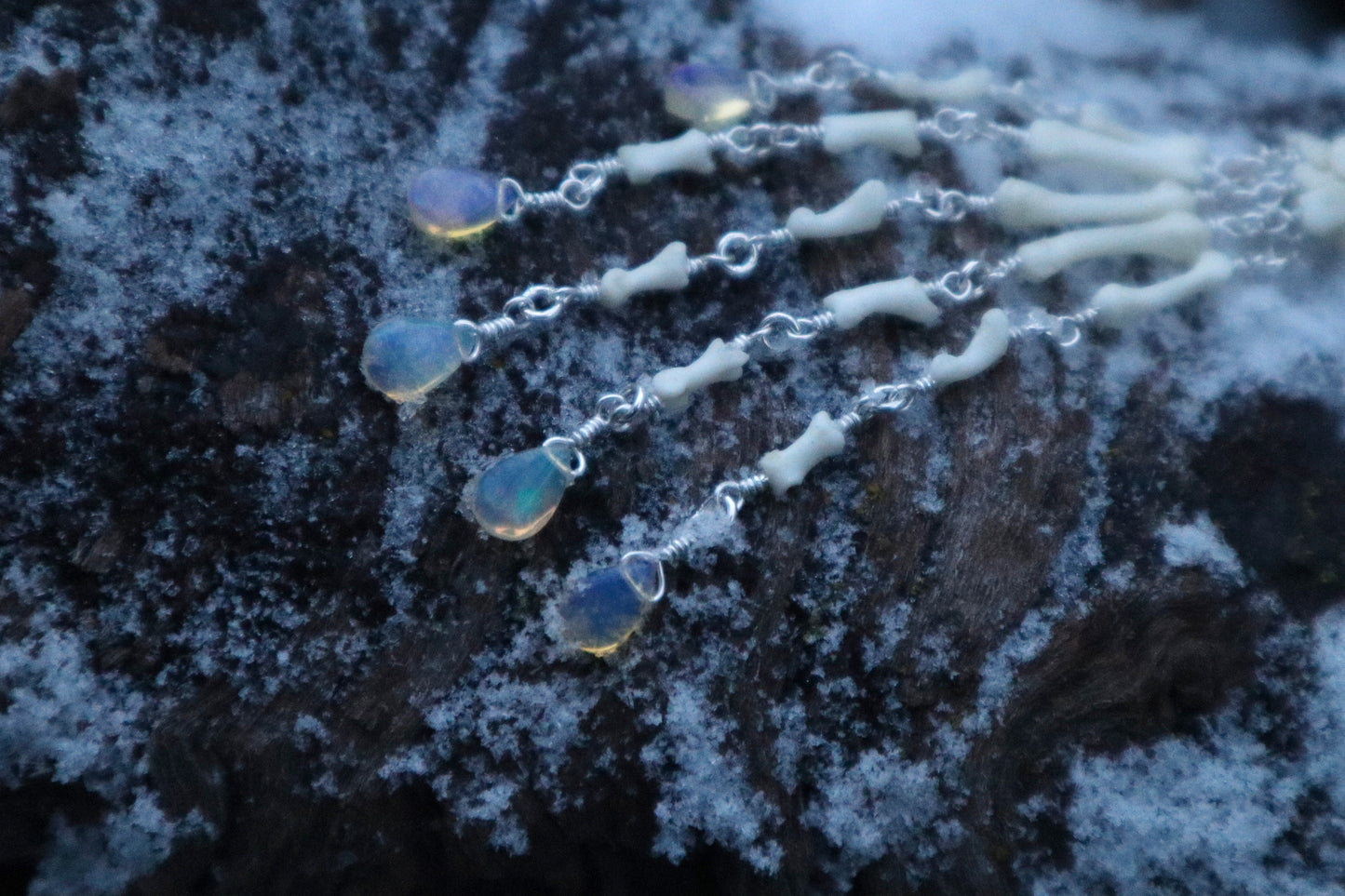 Reserved for Cora - Fluid Striped Skunk Paw Articulation Necklace with Opal “Claws”
