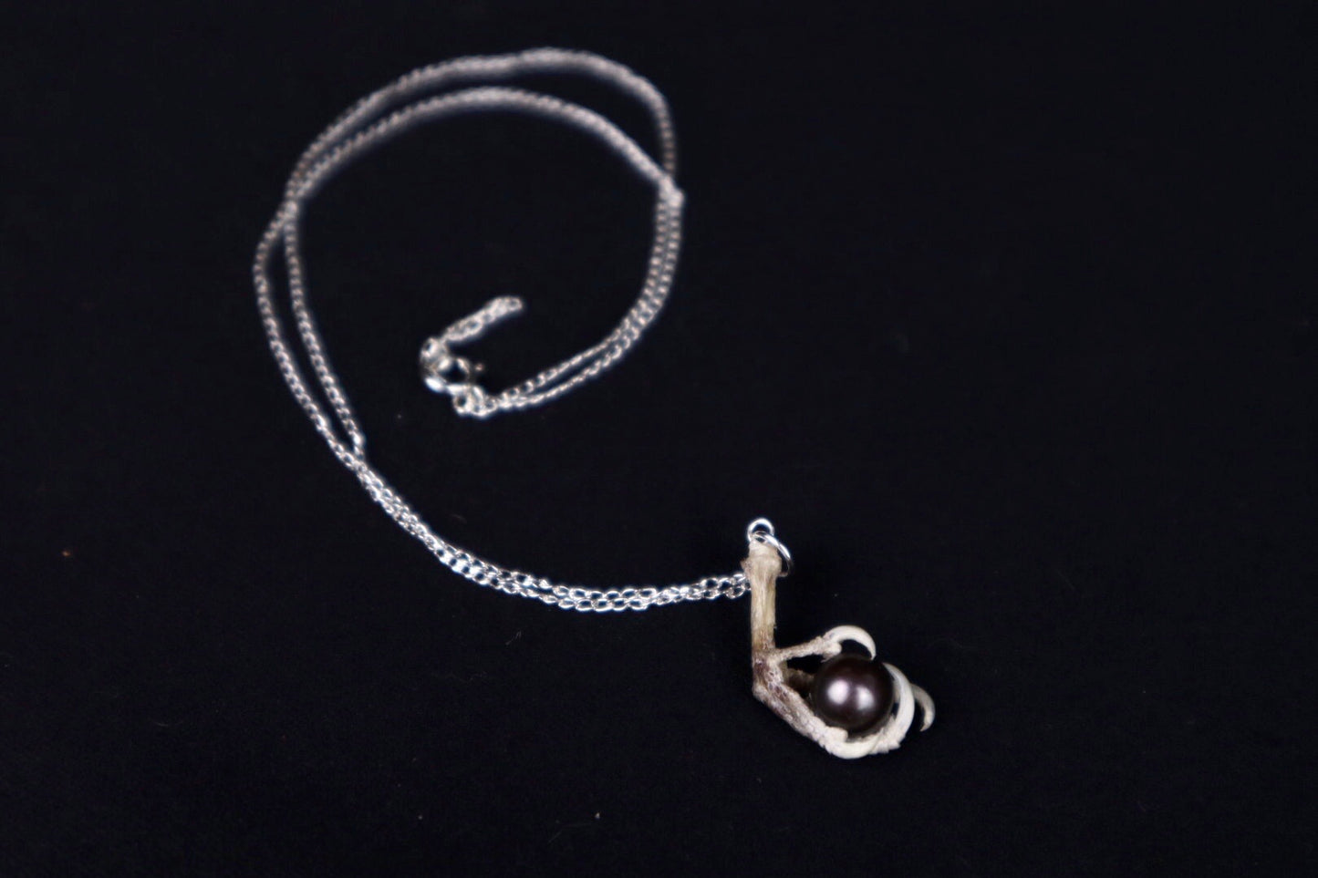 Clutched Pearl Necklace