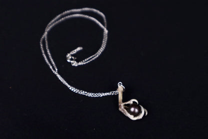 Clutched Pearl Necklace