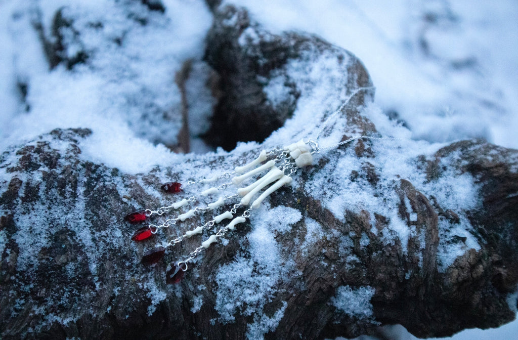 Reserved for Ann-Marie Beach - Fluid Striped Skunk Paw Articulation Necklace with Garnet “Claws”