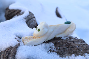 Reserved for Amanda - Mountain Lion Bone Carving with an Emerald and Peridot Eyes