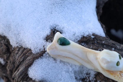 Reserved for Amanda - Mountain Lion Bone Carving with an Emerald and Peridot Eyes
