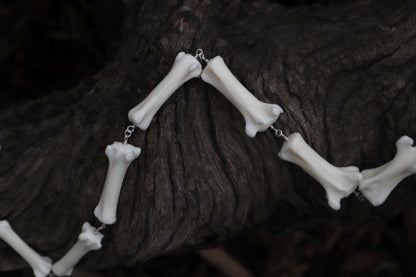 Fluid Gray Wolf Tail Articulation with Ouroboros Ring